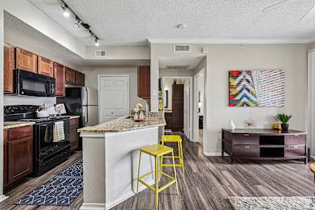 resident clubhouse with an internet café and cozy fireplace
