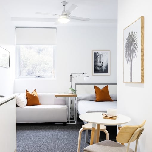 a living room with a couch and a table