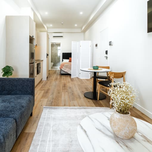 a living room with a couch and a coffee table