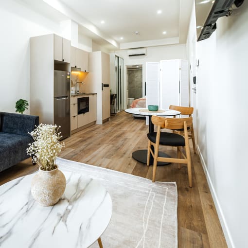 a living room with a couch and a table