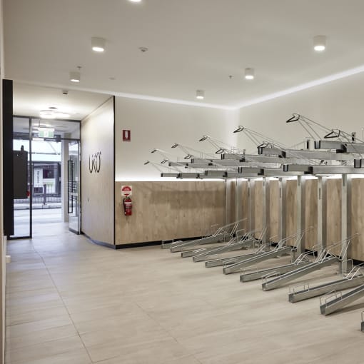 a row of bike racks in a fitness room