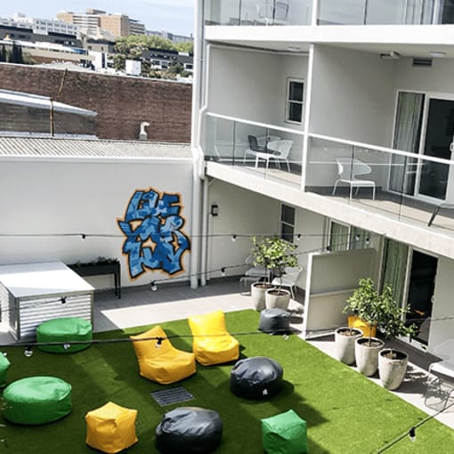 a communal area on the roof of an apartment building
