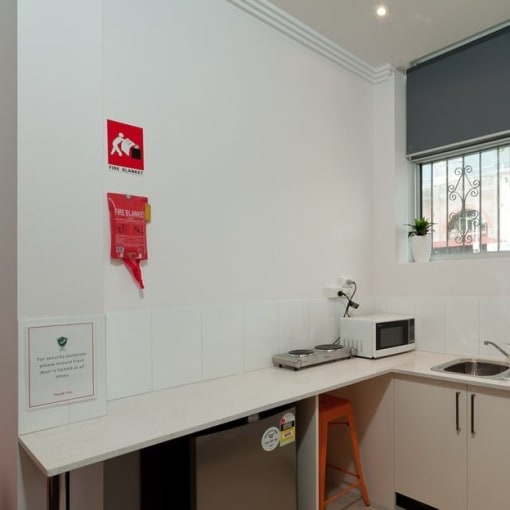 a kitchen with a sink and a window