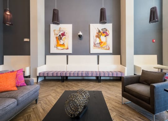 a living room with couches and a coffee table at Linden on the GreeneWay, Florida, 32824
