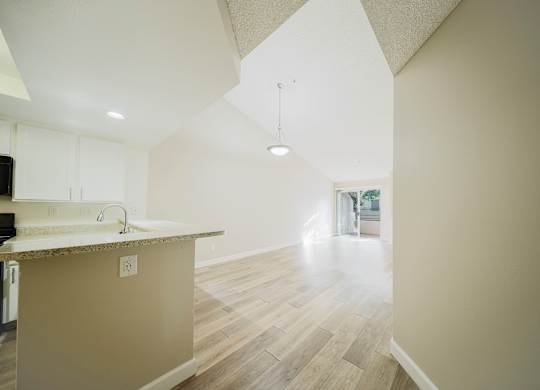 A kitchen with a counter and cabinets. at Legends at Rancho Belago, Moreno Valley
