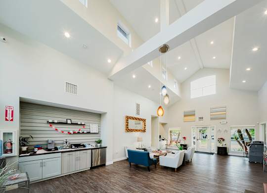 A spacious kitchen with a dining area and a living room. at Legends at Rancho Belago, Moreno Valley, CA, 92553