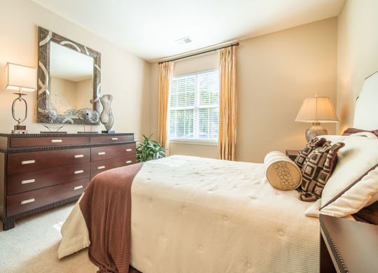 Bedroom With Expansive Windows at Rose Heights Apartments, Raleigh, North Carolina