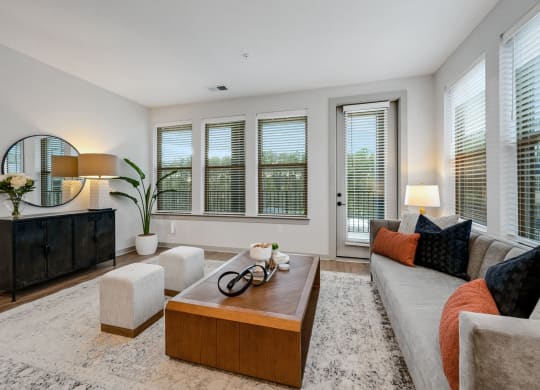 a living room with a couch and a coffee table at Preston Ridge, North Carolina, 27513