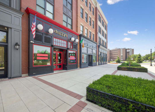 a sidewalk in front of a building on a city street at Park Kennedy, Washington, Washington