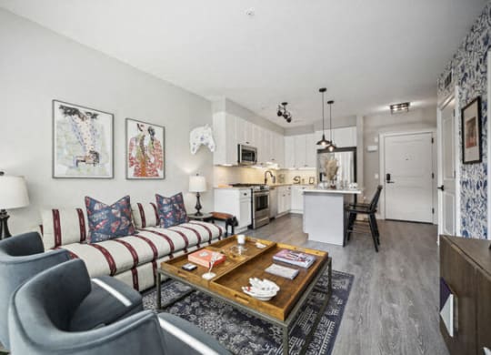 a living room with a couch and a table at Park Kennedy, Washington