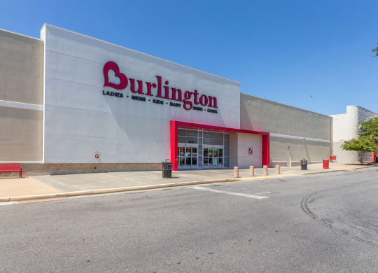 a large white building with a red and black sign that reads burlington at Fairmont at South Lake, Bowie, 20716