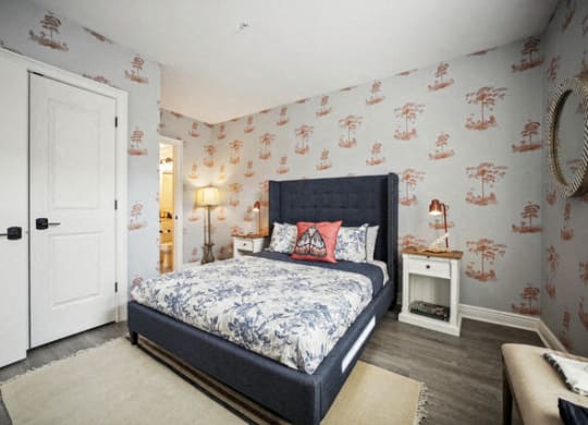 a bedroom with a bed and a white door at Park Kennedy, Washington, DC