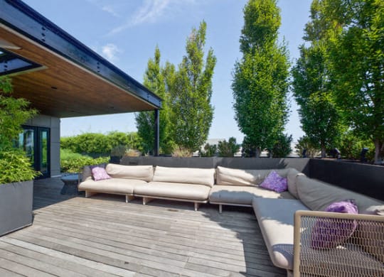 a patio with couches on a wooden deck at Park Kennedy, Washington, Washington