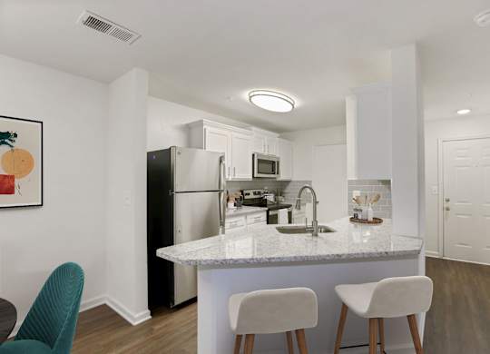 Kitchen with breakfast bar at The Fields of Manassas