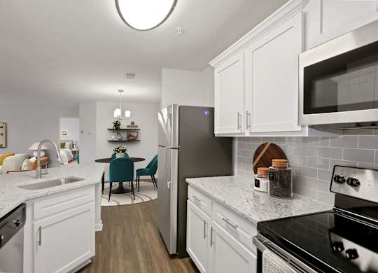 Kitchen with dining room at The Fields of Manassas