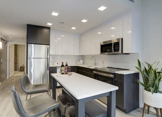 Fitted Kitchen With Island Dining at 1405 Point, Baltimore, 21231