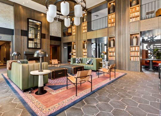 a large lobby with couches chairs and tables at Vyne One Loudoun, Virginia, 20147