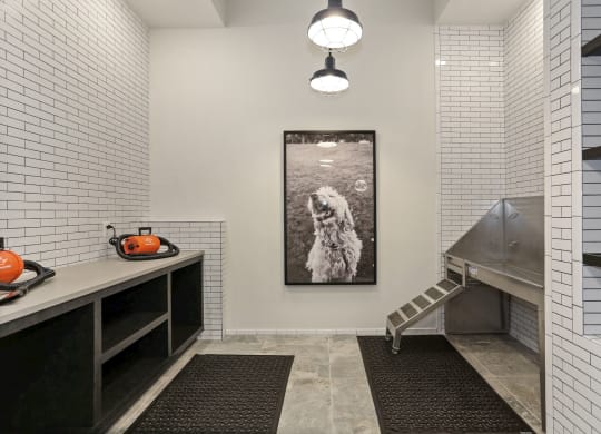 this is a photo of the kitchen of a 560 square foot, 1 bedroom apartment at as at Vyne One Loudoun, Virginia
