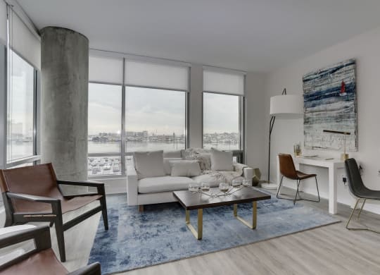 Living Room With Oversized Windows And Doors at 1405 Point, Baltimore, MD