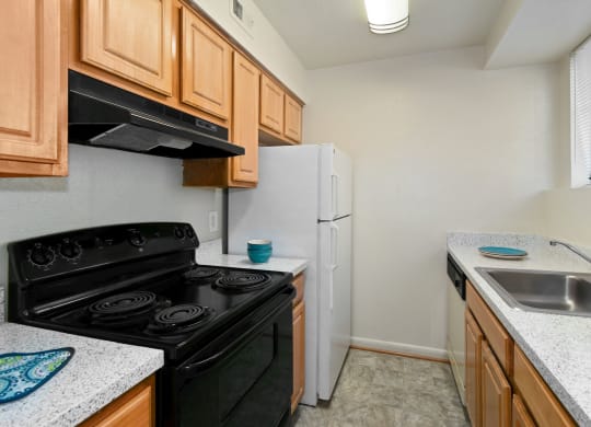 Fully Furnished Kitchen With Stainless Steel Appliances at The Fields of Old Town, Alexandria, Virginia