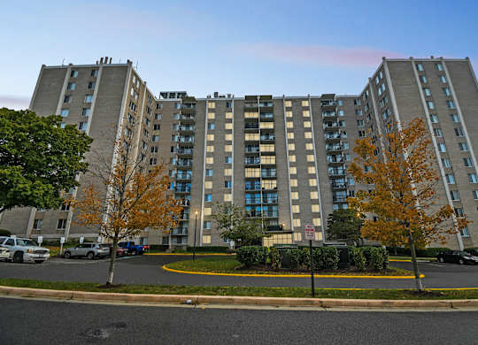 A large apartment building with a parking lot in front at Avondale Overlook, Hyattsville, 20782