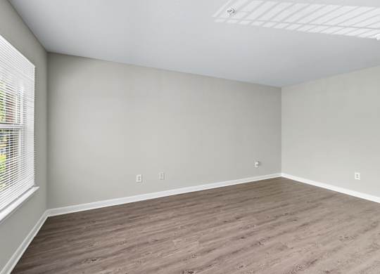 A room with wooden flooring at Greens at Stonecreek, Lithonia, 30038