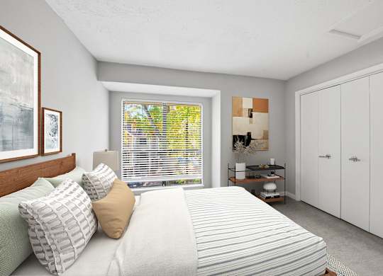 A bedroom with a large bed and a window with blinds at Brampton Moors, Cary, NC, 27513