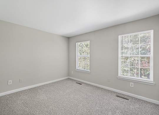 Carpeted Bedroom at Greens at Stonecreek, Lithonia, Georgia