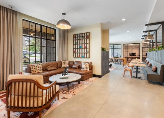the lobby of a hotel with couches and tables at Hawkins Press, North Carolina