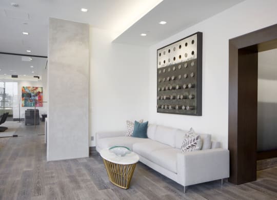a living room with a white couch and a coffee table at 1305 Dock Street, Maryland