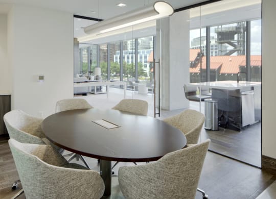 a conference room with a table and chairs at 1305 Dock Street, Baltimore, 21231