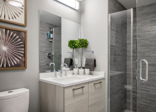 a bathroom with a sink and a shower at 1305 Dock Street, Baltimore, MD