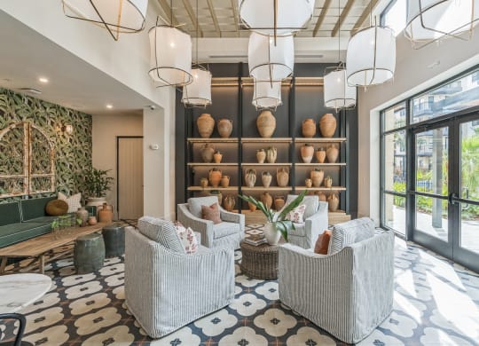 a lobby with chairs and a wall filled with vases  at La Unión, Florida