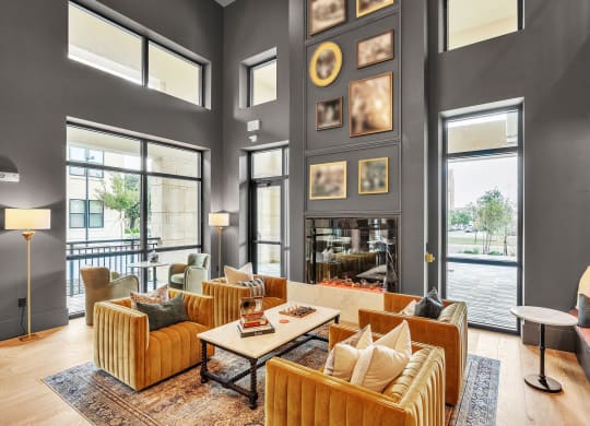 a living room with couches and chairs and a fireplace  at La Unión, Tampa