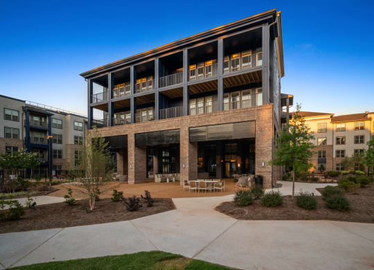an office building with a courtyard in front of it at Preston Ridge, Cary, NC, 27513