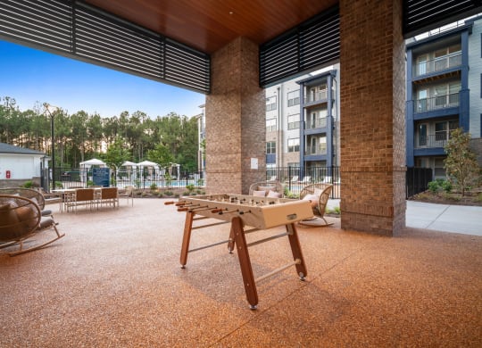 play a game of foosball on our patio at Preston Ridge, North Carolina