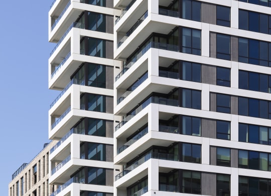 a close up of the facade of a high rise building at The Boro, Tysons