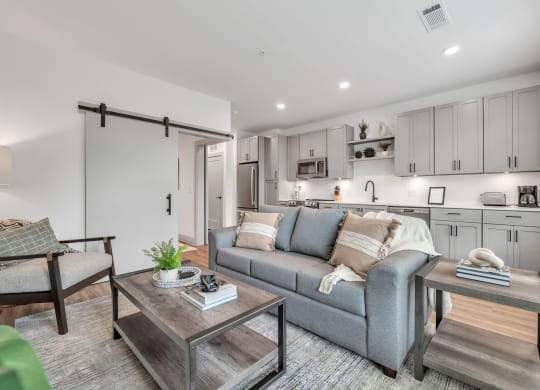 a living room with a couch and a table