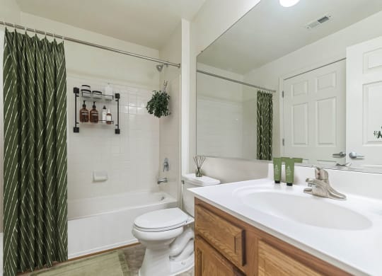 Bathroom with soaking tub and shower at Sanger Place Apartments in Lorton VA at Sanger Place, Virginia