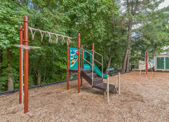 our playground is equipped with a swing set and a slide at Sanger Place, Virginia, 22079