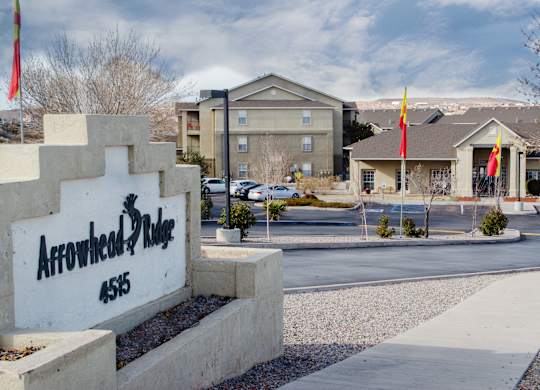 The Arrowhead Ridge sign is in front of a building at Arrowhead Ridge Apartments, Rio Rancho, 87124