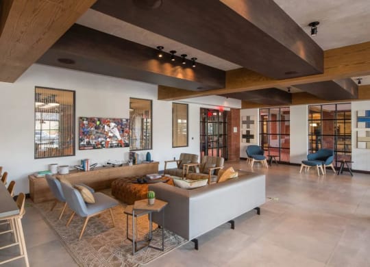 a living room with a couch and chairs and a table at Reed Row, Washington