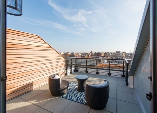 a roof terrace with a view of the city at Reed Row, Washington, Washington DC