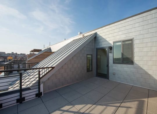 the roof terrace of the building has views of the city at Reed Row, Washington, 20009