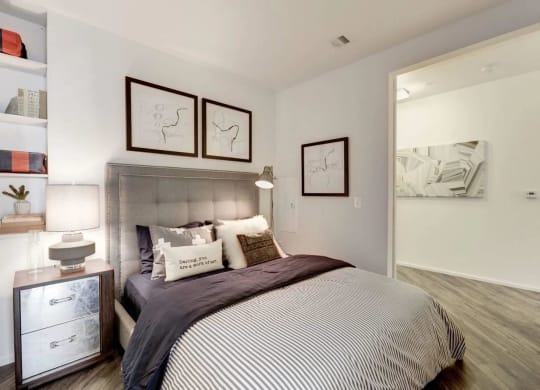a bedroom with a bed and a closet at Reed Row, Washington, Washington DC