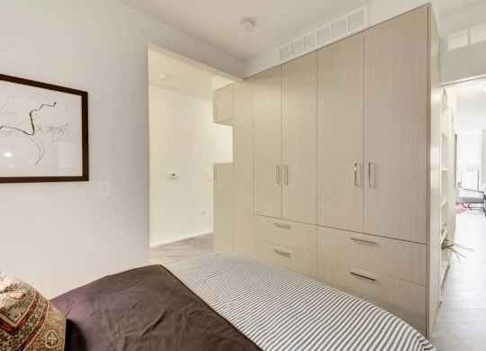 a bedroom with a bed and a closet at Reed Row, Washington