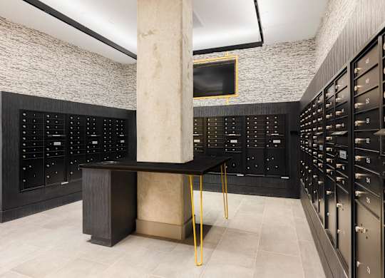 a wine cellar with racks and a table in the middle  at Coda at Bryant Street, Washington, DC