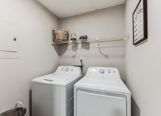 a washer and dryer in the laundry room at Brampton Moors, Cary