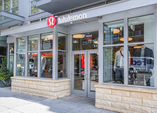 A Lululemon storefront with a red logo above the entrance.