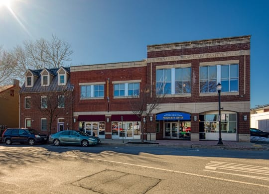a brick building with cars parked in front of it at North Market South Carroll, Maryland